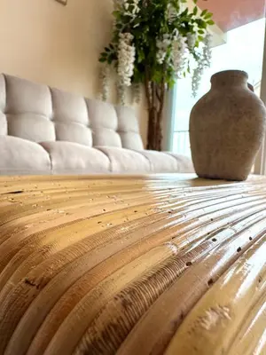 a table with a vase sitting on top of it at Casa Palmera in Sueca
