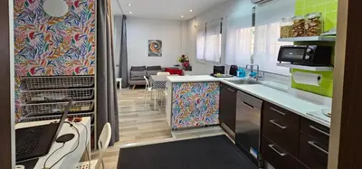 a kitchen with a sink and a counter top at Estudio Loft área Ruzafa in Valencia