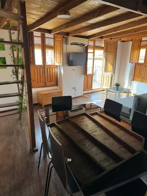 a dining room with a glass table and chairs at Piso 4 - Apartamento Mercado Central in Valencia