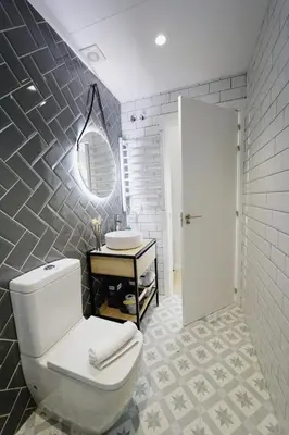 a bathroom with a toilet and a sink at Beautiful modern loft 1km from the sea in Valencia in Valencia