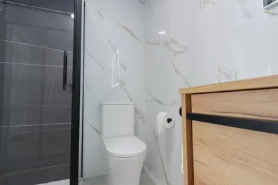 a bathroom with a toilet and a shower at La plata 59 in Valencia