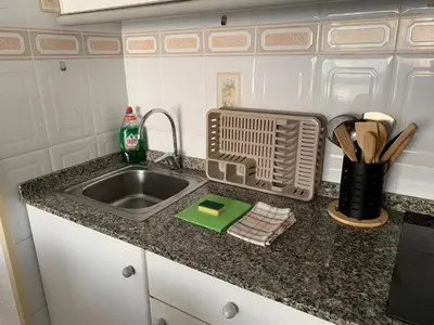 a kitchen counter top with a sink and a sink at Plaza Mare Nostrum 5 min playa in Puerto de Sagunto