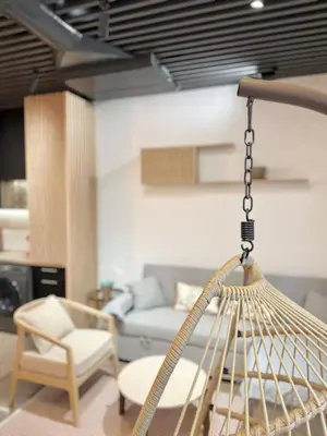 a hammock in a living room with a couch at FALLAS en el barrio del Carmen, el corazón de Valencia in Valencia