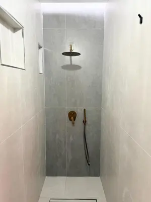 a bathroom with a shower with a glass door at FALLAS en el barrio del Carmen, el corazón de Valencia in Valencia