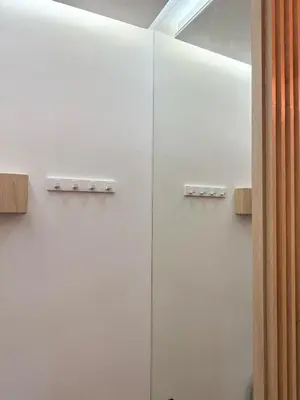 a row of white cabinets in a room at FALLAS en el barrio del Carmen, el corazón de Valencia in Valencia