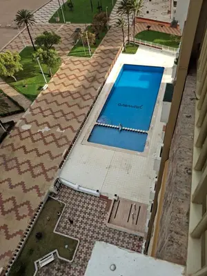 an overhead view of a swimming pool in a building at Arensol Playa de Cullera in Cullera