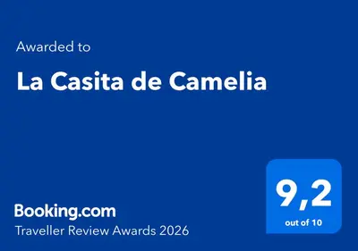 a blue screen with the text translated to la castle de camelia at La Casita de Camelia in Valencia