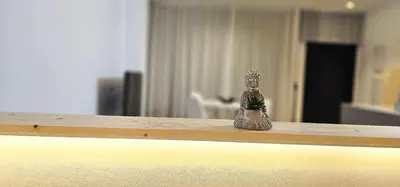 a small figurine sitting on top of a table at Vacansis Masamagrell Bajo Loft Tomas y Valiente in Masamagrell
