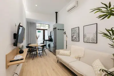 a living room with a couch and a table at Elegant Loft in Valencia in Valencia