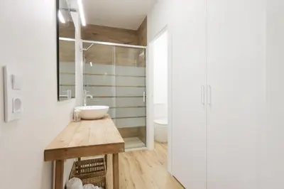a bathroom with a sink and a toilet at ADapartments in Valencia