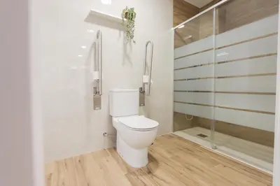 a bathroom with a toilet and a shower at ADapartments in Valencia