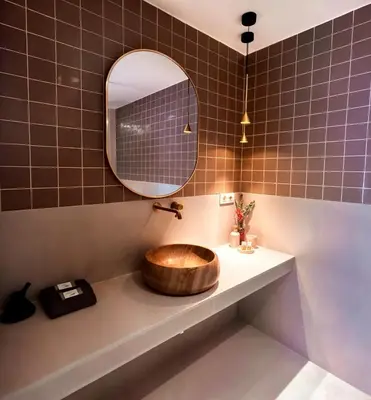 a bathroom with a wooden sink and a mirror at Pivote Flats-Playa A in Valencia