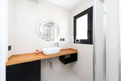 a bathroom with a sink and a mirror at Carme Sky in Valencia