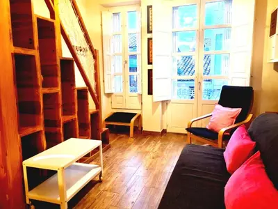 a living room with a couch and chairs and windows at Padre Luis flat in Valencia
