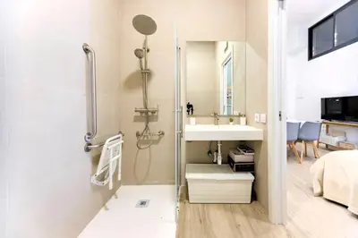 a bathroom with a shower and a sink at Parque de Cabecera & Bioparc Apartment in Valencia