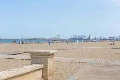 a view of a beach with people on the sand at Ca La Leni Beach 0 in Valencia