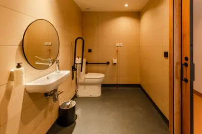 a bathroom with a sink and a mirror at easyHotel Valencia Ciutat Vella in Valencia