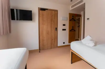 a bathroom with a shower and a sink at easyHotel Valencia Ciutat Vella in Valencia