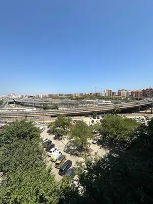 a group of cars parked in a parking lot at Paradise Home in Valencia