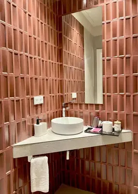 a bathroom with a sink and a mirror at Osito Hub - Colomer in Valencia