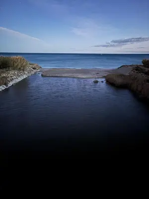 a body of water with the ocean in the background at Wohnung in Moncófar