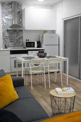a living room with a large flat screen tv on a wall at Zabas FLAT in Alboraya