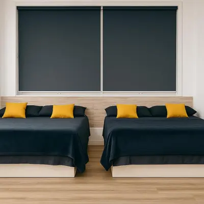two beds in a room with two windows at Alojamiento, hospedaje para 6 personas in Valencia