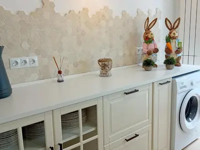 a kitchen with a white counter and a washing machine at Casa El Azud La Cañada 1 minuto metro in Partida de La Cañada