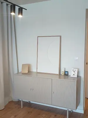 a white dresser with a mirror on top of it at LOFT ROYAL - apartamento 