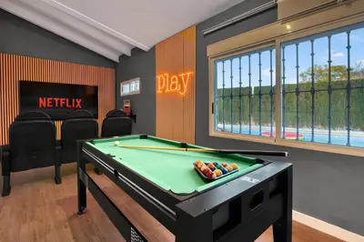 a billiard room with a pool table in it at Private Garden Villa near Valencia with Cinema and Gym in La Eliana