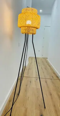 a yellow lamp sitting on top of a wooden floor at Plus Ultra Ruzafa 6 in Valencia