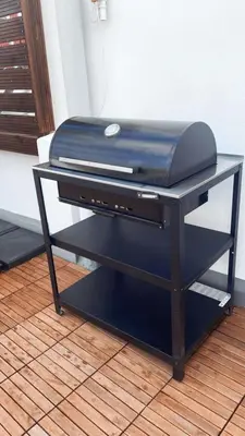 a grill sitting on top of a table at Stylish and renovated house in Cullera
