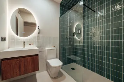 a bathroom with a toilet and a sink and a shower at The Atelier Lofts in Valencia