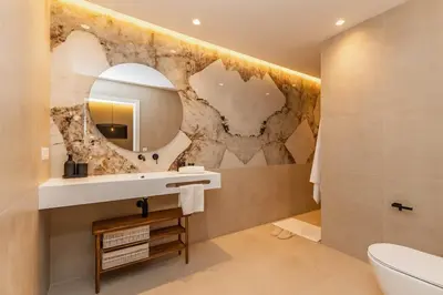 a bathroom with a sink and a mirror at SariStays Valencia Luxe Touch in Valencia