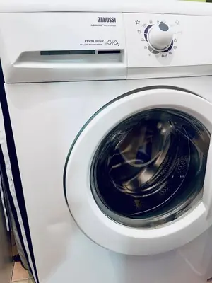 a white washing machine with its door open at Planta baja en pleno centro de la playa in Moncófar
