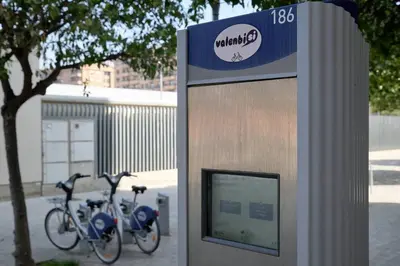 two bikes are parked next to a sign at Romantic Suite Roig Arena N4 Virkin Suites in Valencia