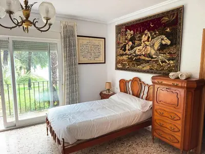 a living room with a couch and a fireplace at La casa del señorito in Tous