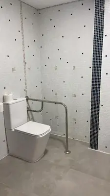 a bathroom with a white toilet and a shower at Hostal Casa Sifre in Villanueva de Castellón