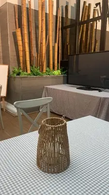 a room with a table and a tv and a table sidx sidx sidx at Hostal Casa Sifre in Villanueva de Castellón