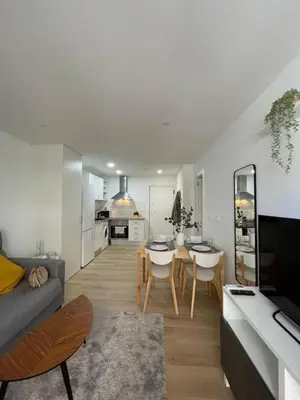 a living room with a couch and a table at Where You Feel Home in Godella