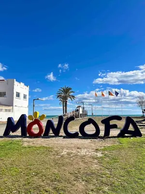 a large sign that says miami on the beach at Apartment with the pool in Moncófar