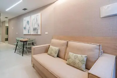 a living room with a couch and a table at VLC HOST - Palleter in Valencia