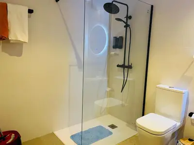 a bedroom with a bed and a flat screen tv at Ubicación inmejorable Hotel privado junto a la Ciudad de las Artes y a un paso del Turia in Valencia