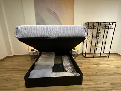 a mattress sitting on top of a bed in a room at La fonda de Olympia in Valencia