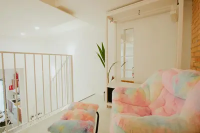a living room with a couch and a chair at Apartment 2 City of Arts and Science Fast Wifi 2 in Valencia
