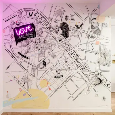 a wall with a drawing of a city at GuestReady - Homely escape in Valencia in Valencia