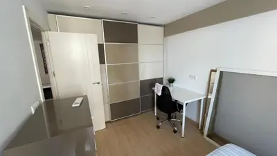 a room with a desk and a computer in it at Flat close to beach perfect for families and groups - Isidro B 3 in Valencia