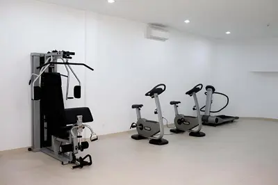 a row of exercise bikes in a room at Resort & Suites Ciudad de las Ciencias By VALENCIAFLATS EU in Valencia