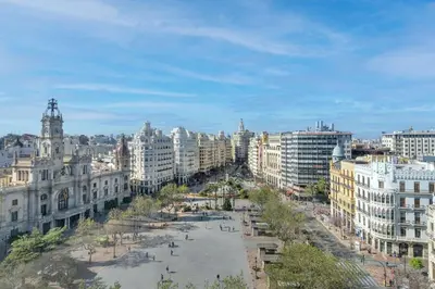 a view of a city with buildings and a street at Grand Hotel Centenari, Valencia, Autograph Collection in Valencia