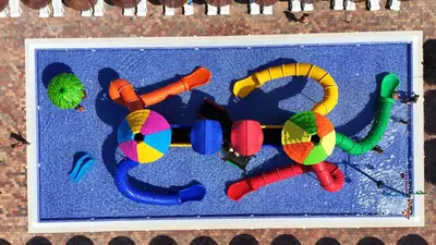 a display of colorful toys on the ground at Camping Los Naranjos in Moncófar